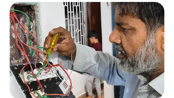 Electrician working on a switchboard in Ranchi